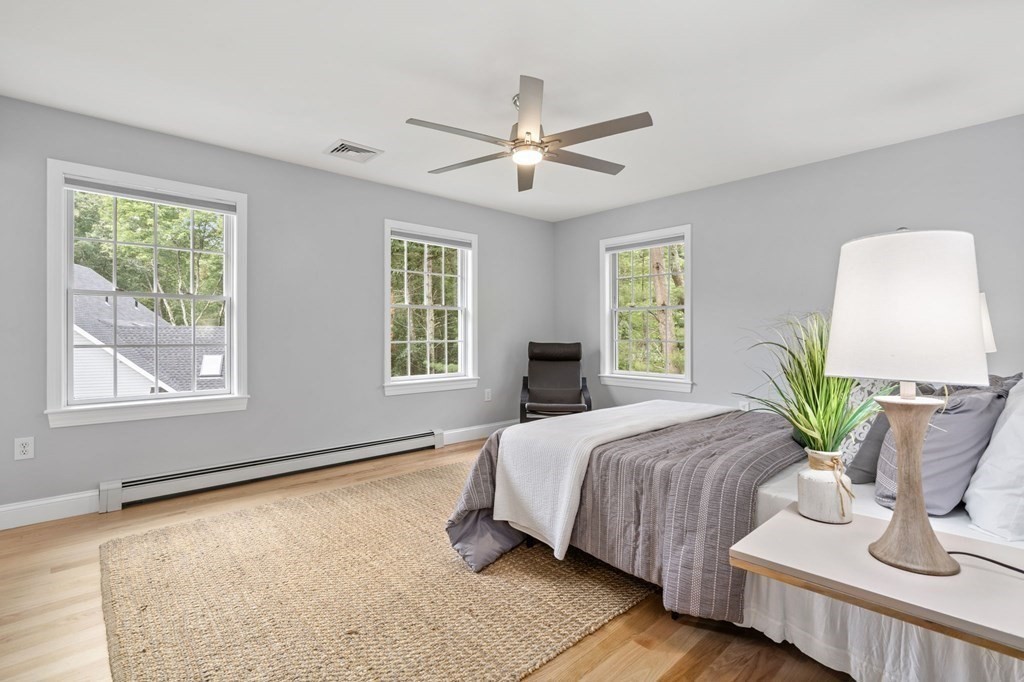 11 Fort Pond Road Acton, MA 01720 - Photo 21 of 40 a bedroom with a bed and window