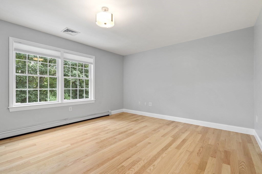 11 Fort Pond Road Acton, MA 01720 - Photo 26 of 40 a view of an empty room with a window