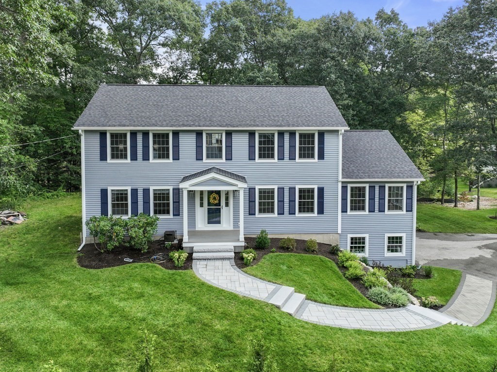 11 Fort Pond Road Acton, MA 01720 - Photo 3 of 40 a aerial view of a house