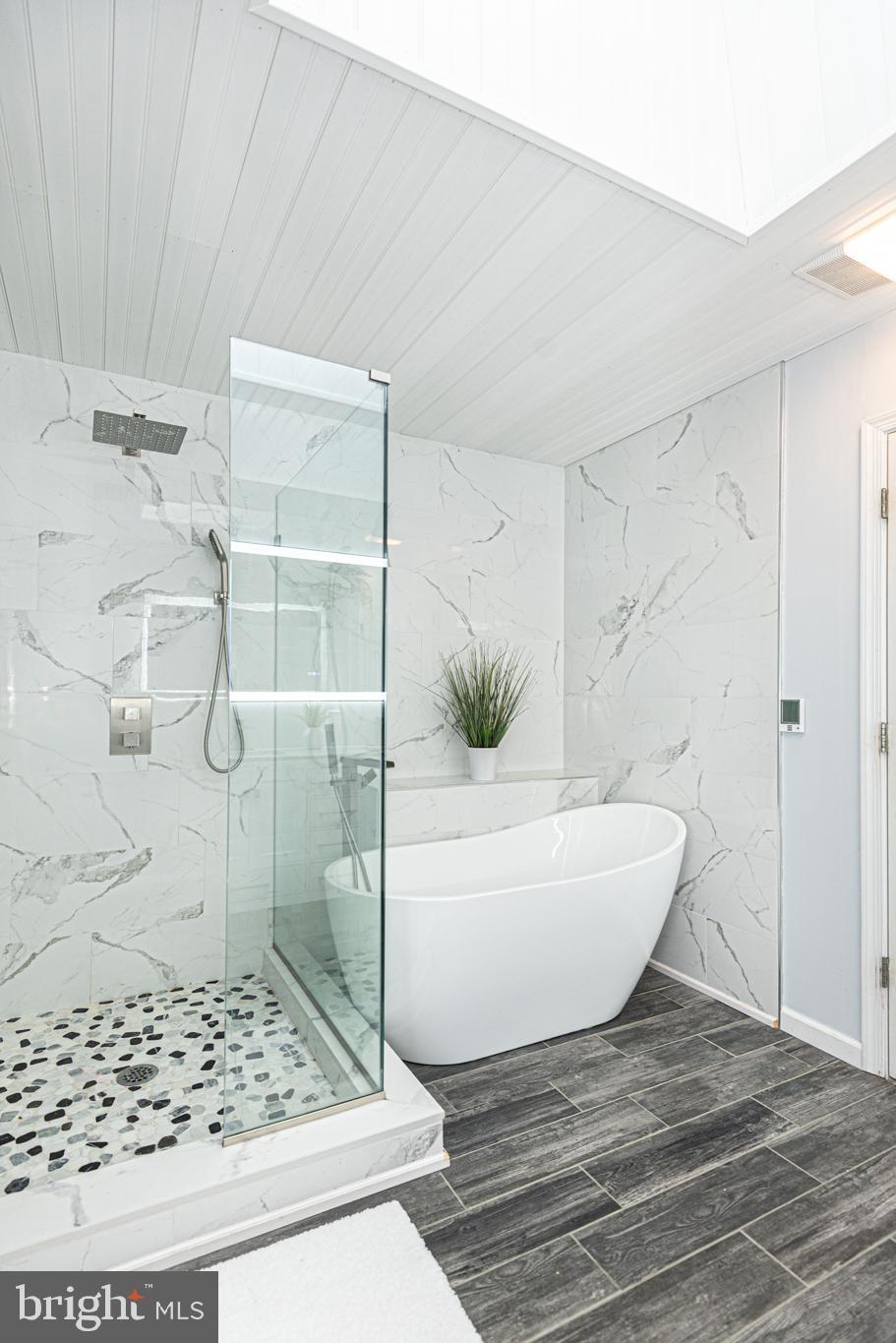 74 Birdnest Drive Ocean Pines, MD 21811 - Photo 22 of 89 a bathroom with a bathtub and shower