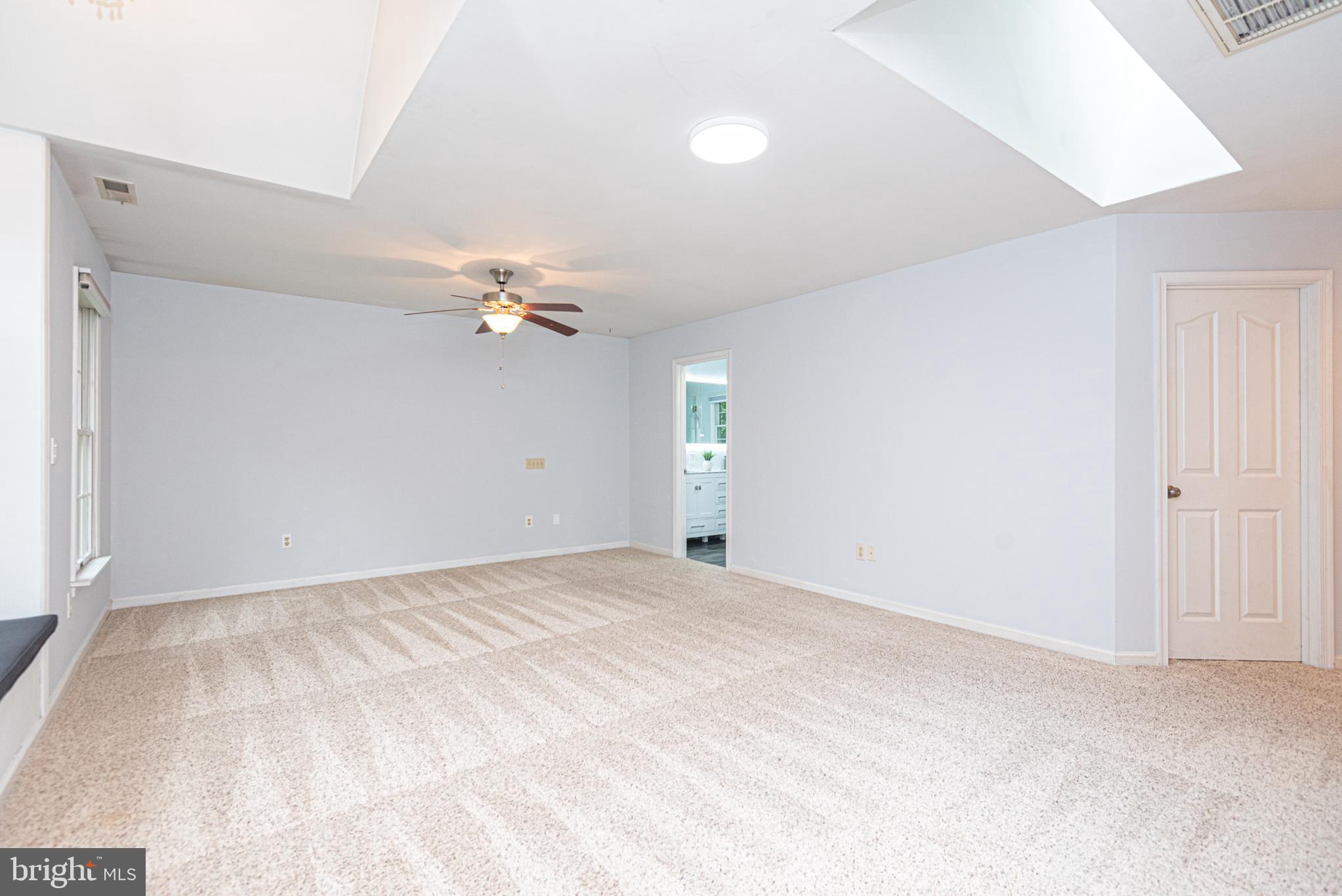 74 Birdnest Drive Ocean Pines, MD 21811 - Photo 32 of 89 a view of a livingroom with a ceiling fan and window
