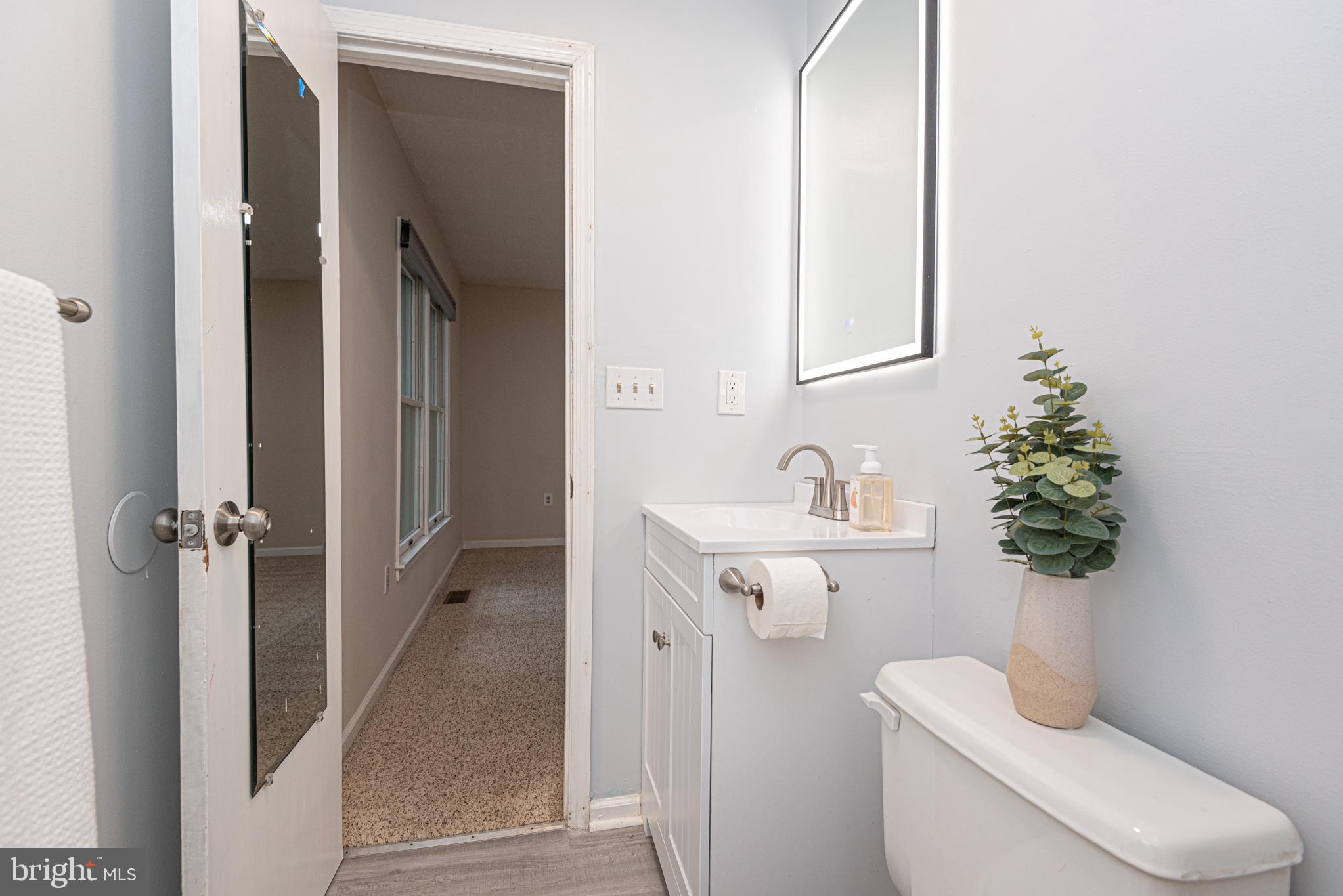 74 Birdnest Drive Ocean Pines, MD 21811 - Photo 39 of 89 a bathroom with a sink toilet and shower