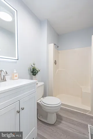 a view of a backyard with swimming pool