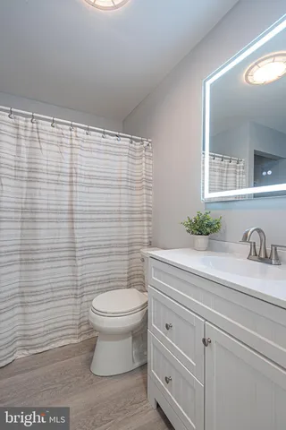 a view of a house with swimming pool and porch