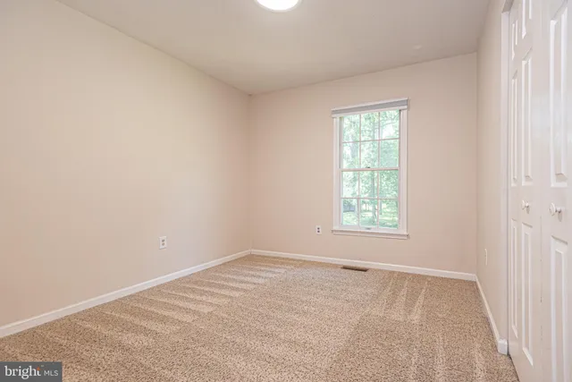 an aerial view of residential house with outdoor space