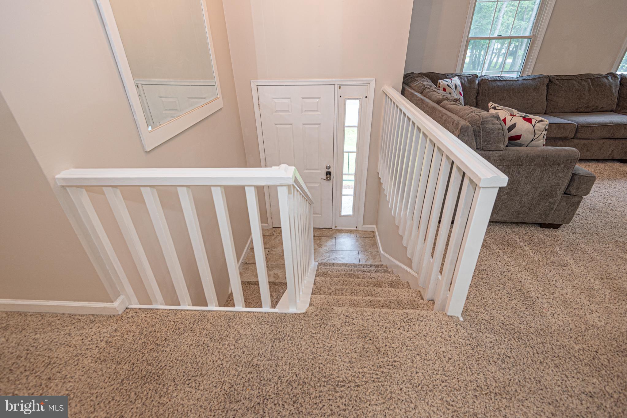 74 Birdnest Drive Ocean Pines, MD 21811 - Photo 52 of 89 a view of a livingroom with furniture and stairs