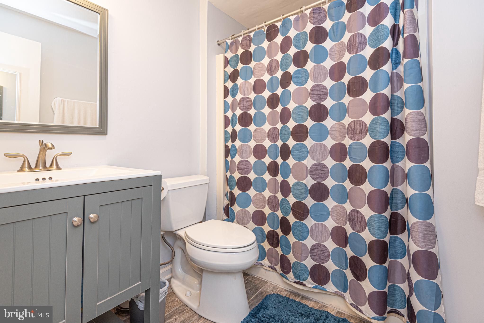 74 Birdnest Drive Ocean Pines, MD 21811 - Photo 58 of 89 a bathroom with a sink and a toilet