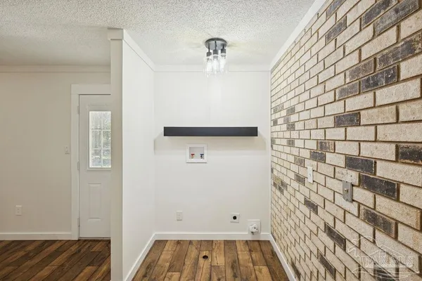 a view of livingroom with hardwood floor and a ceiling fan