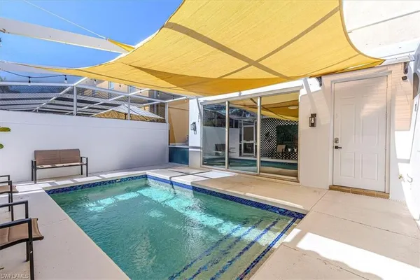 a view of a backyard with a patio