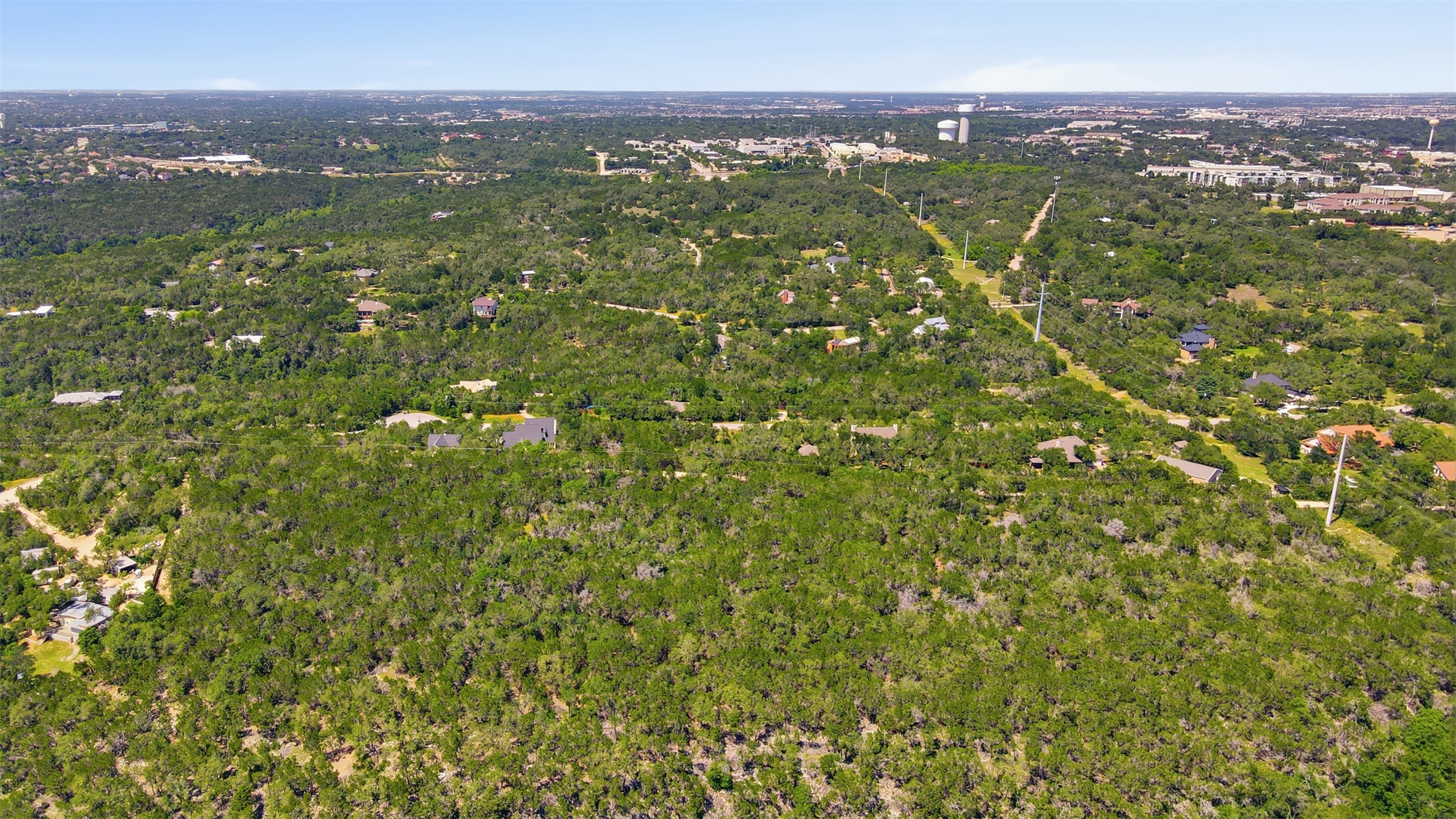 0 North Ranch Road 620 Road Austin, TX 78726 - Photo 13 of 20 a view of a city with lush green forest