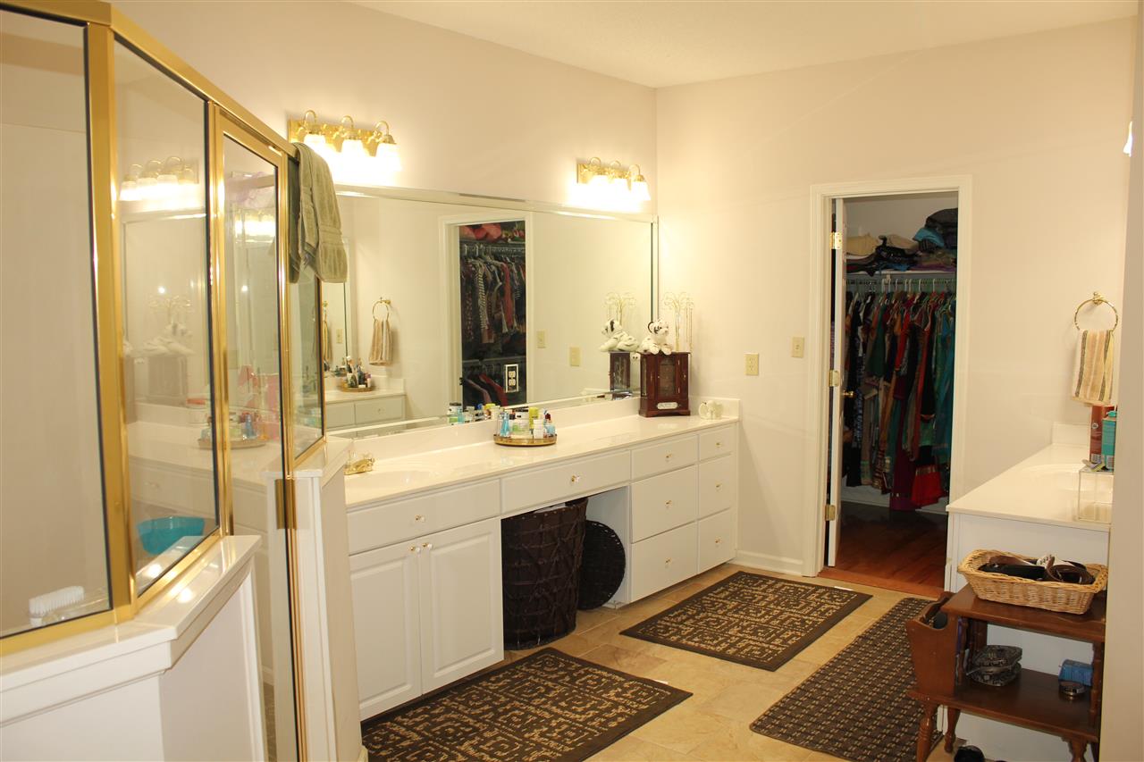 355 Forest Hill-Irene Road Memphis, TN 38018 - Photo 11 of 25 a bathroom with a sink and a mirror
