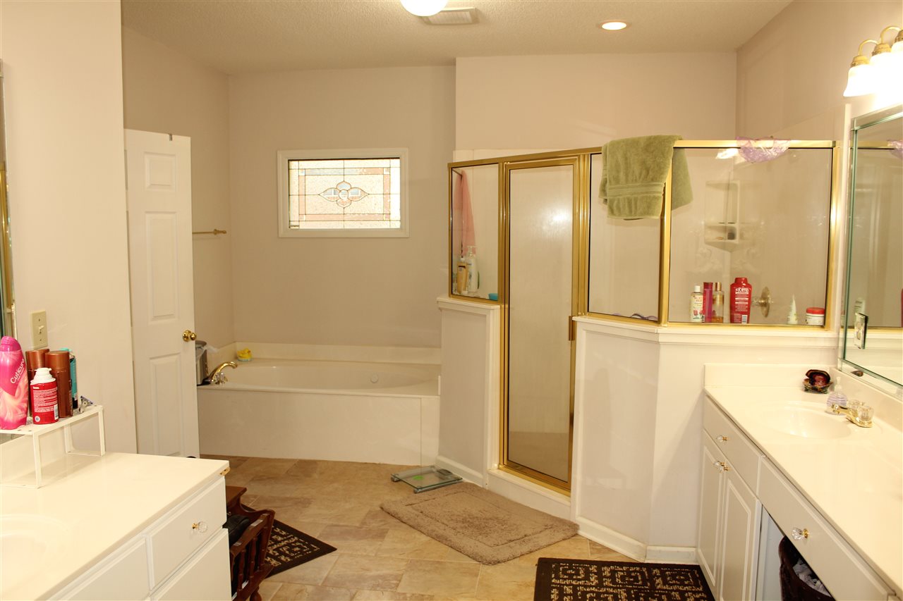 355 Forest Hill-Irene Road Memphis, TN 38018 - Photo 12 of 25 a bathroom with a sink and a shower
