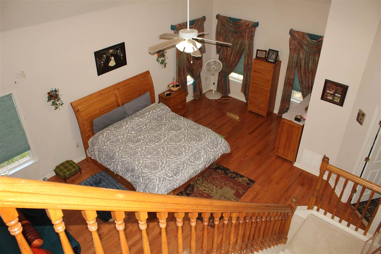 355 Forest Hill-Irene Road Memphis, TN 38018 - Photo 14 of 25 a living room with furniture and a flat screen tv