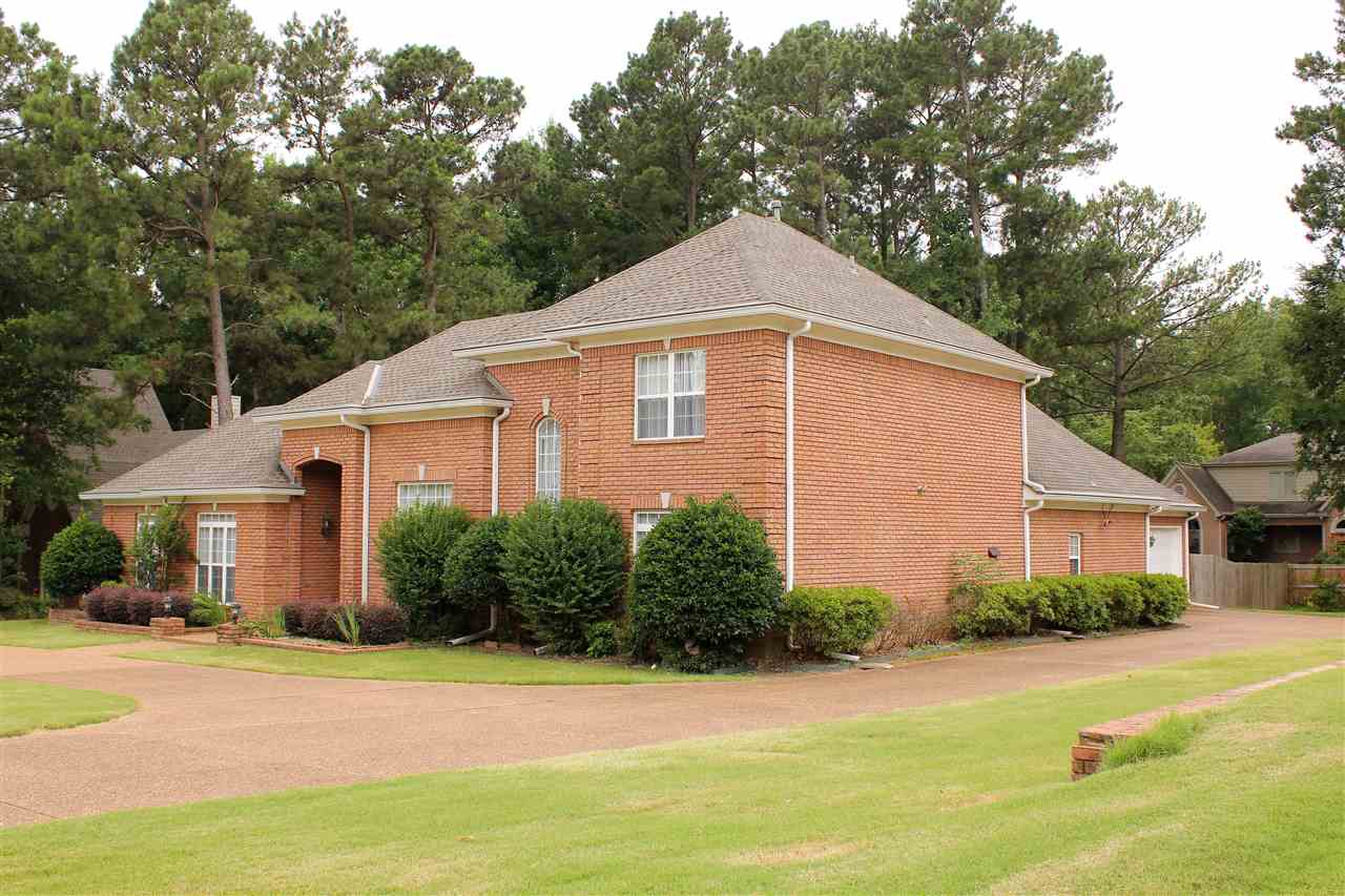 355 Forest Hill-Irene Road Memphis, TN 38018 - Photo 2 of 25 a front view of a house with a yard and garage