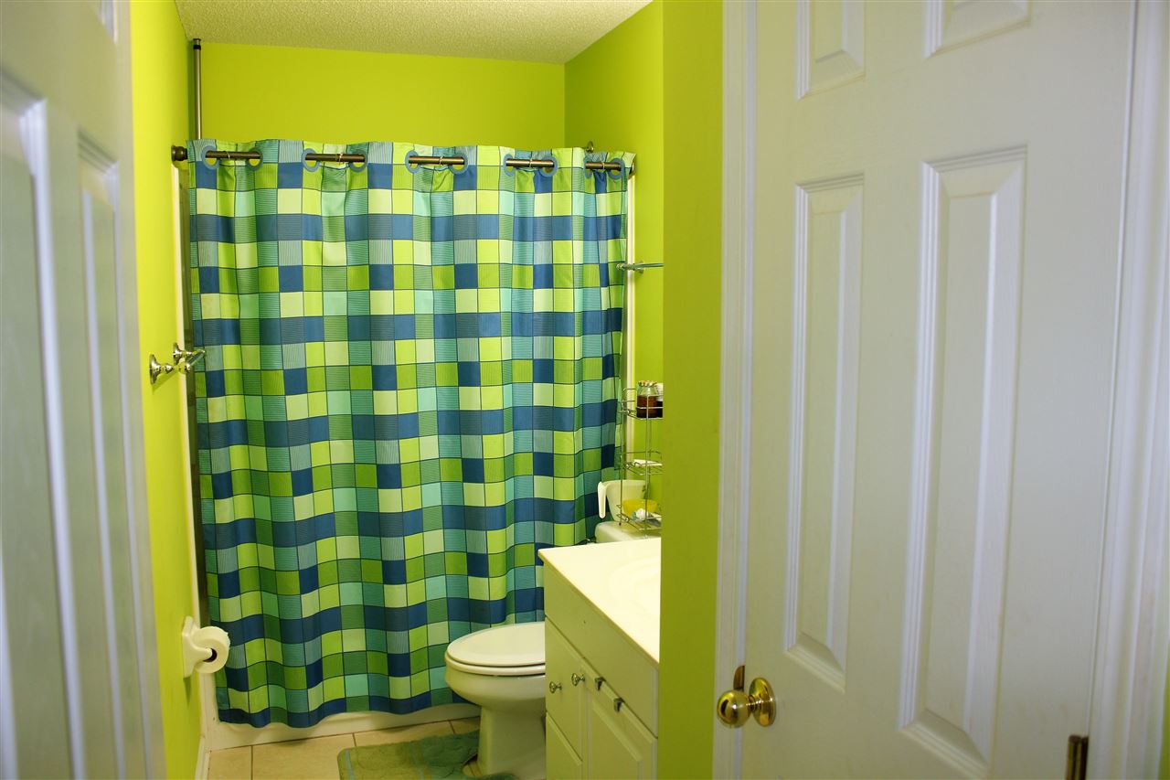355 Forest Hill-Irene Road Memphis, TN 38018 - Photo 24 of 25 a bathroom with a sink toilet and shower