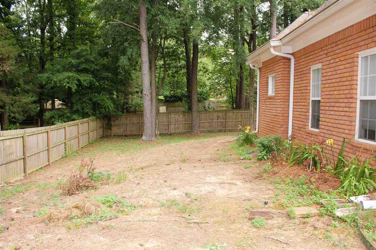 355 Forest Hill-Irene Road Memphis, TN 38018 - Photo 25 of 25 a view of a backyard with garden