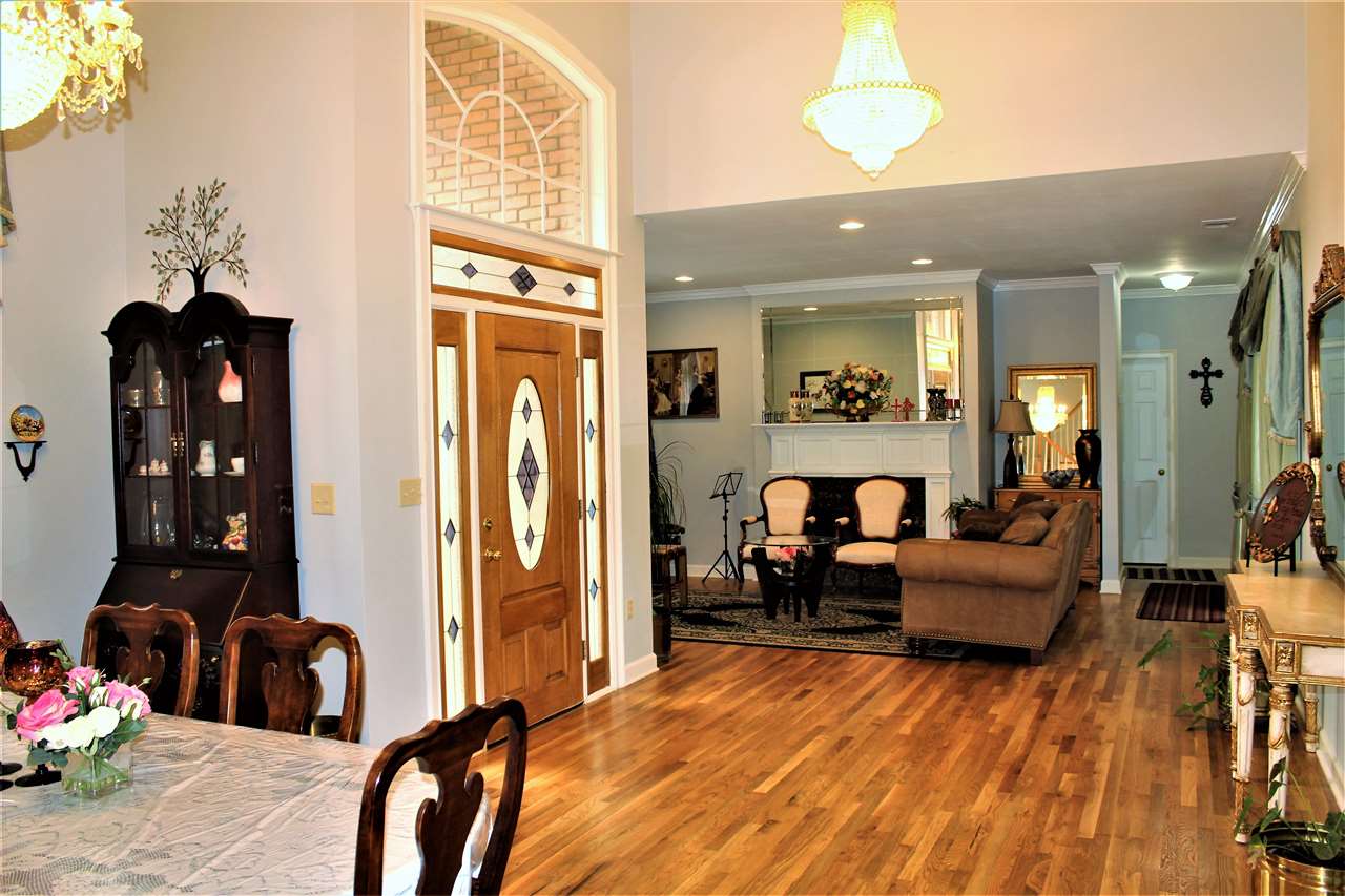 355 Forest Hill-Irene Road Memphis, TN 38018 - Photo 3 of 25 a view of a livingroom with furniture and a large window