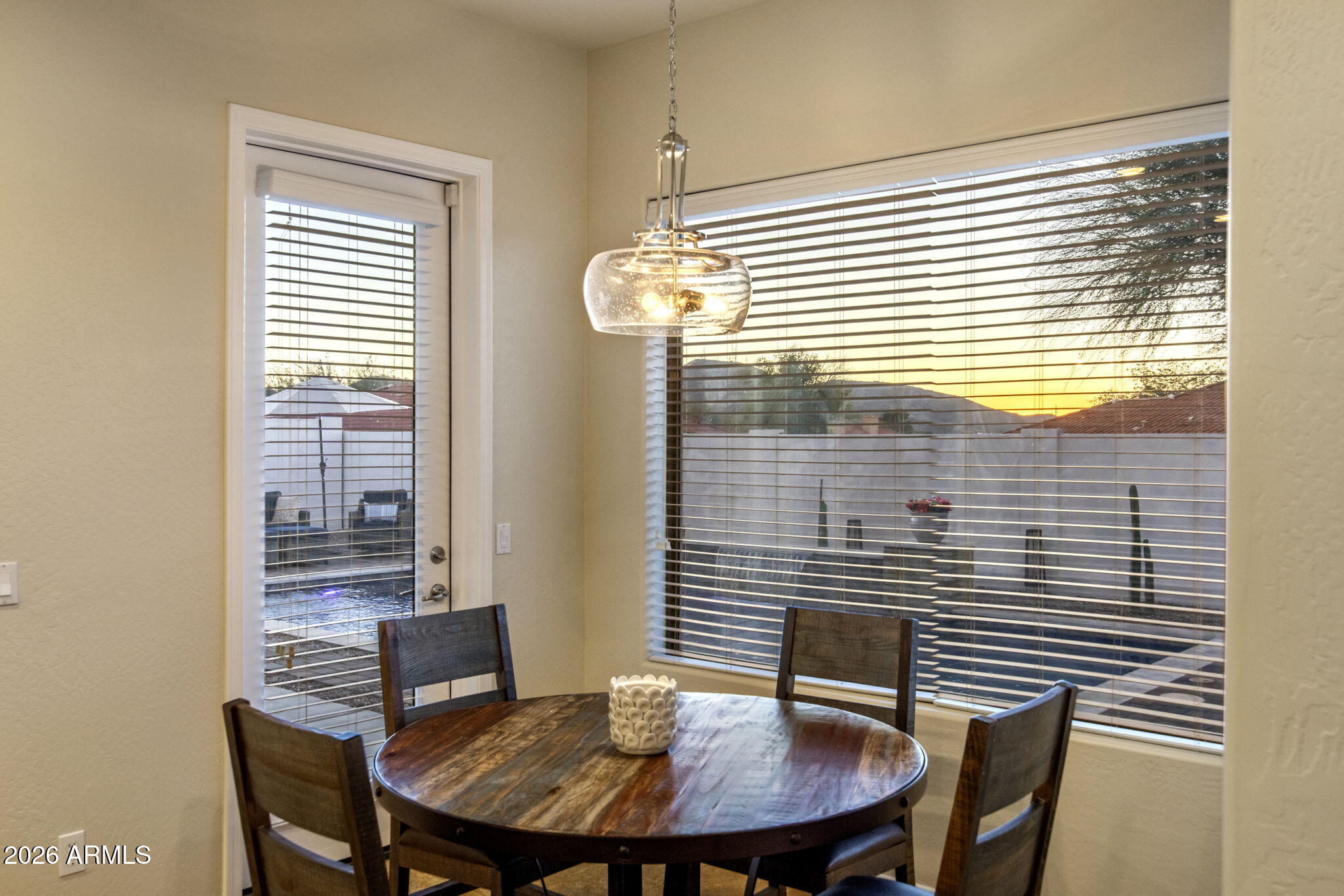 14112 North 12th Street Phoenix, AZ 85022 - Photo 13 of 46 a view of a dining room with furniture and window