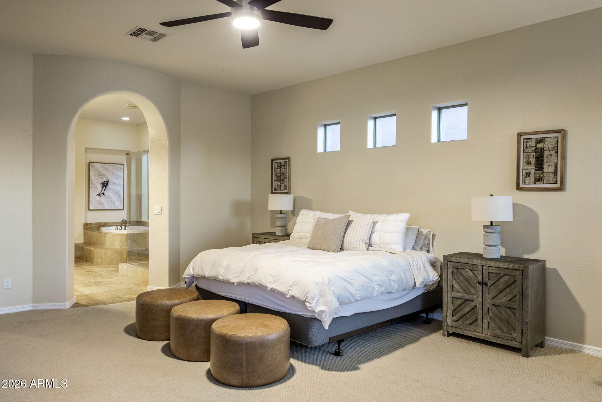 14112 North 12th Street Phoenix, AZ 85022 - Photo 16 of 46 a bedroom with a bed and a chandelier