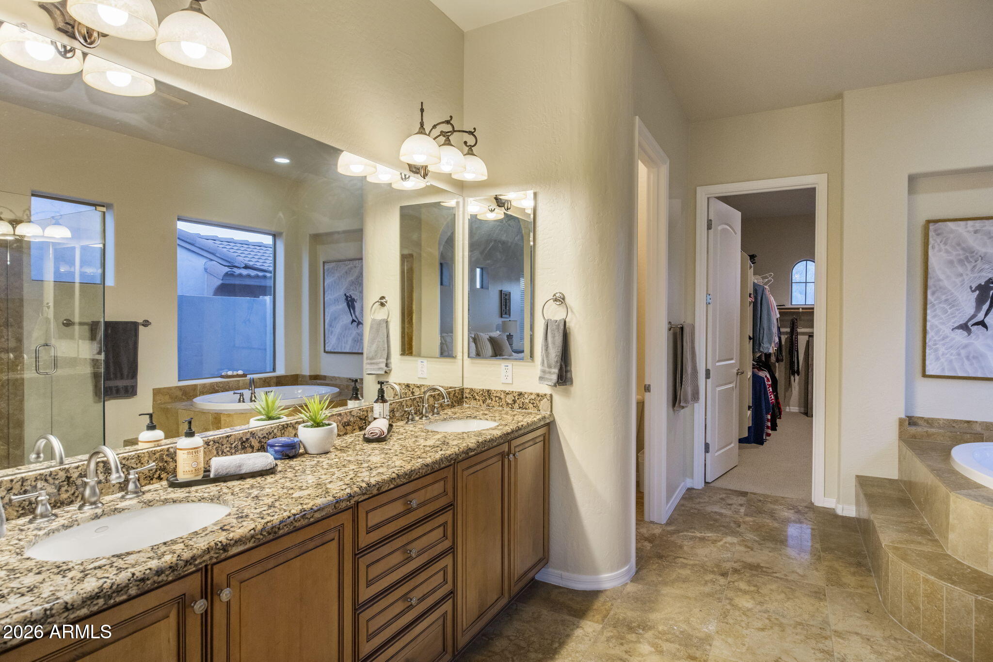 14112 North 12th Street Phoenix, AZ 85022 - Photo 19 of 46 a bathroom with a granite countertop double vanity sink a mirror and a shower