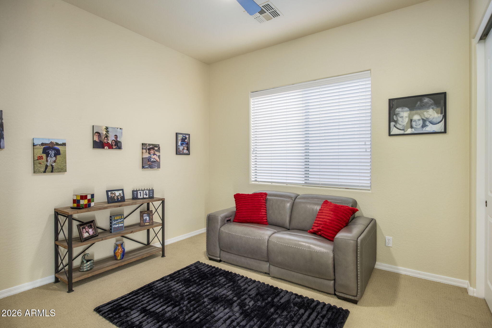 14112 North 12th Street Phoenix, AZ 85022 - Photo 24 of 46 a living room with furniture and a window