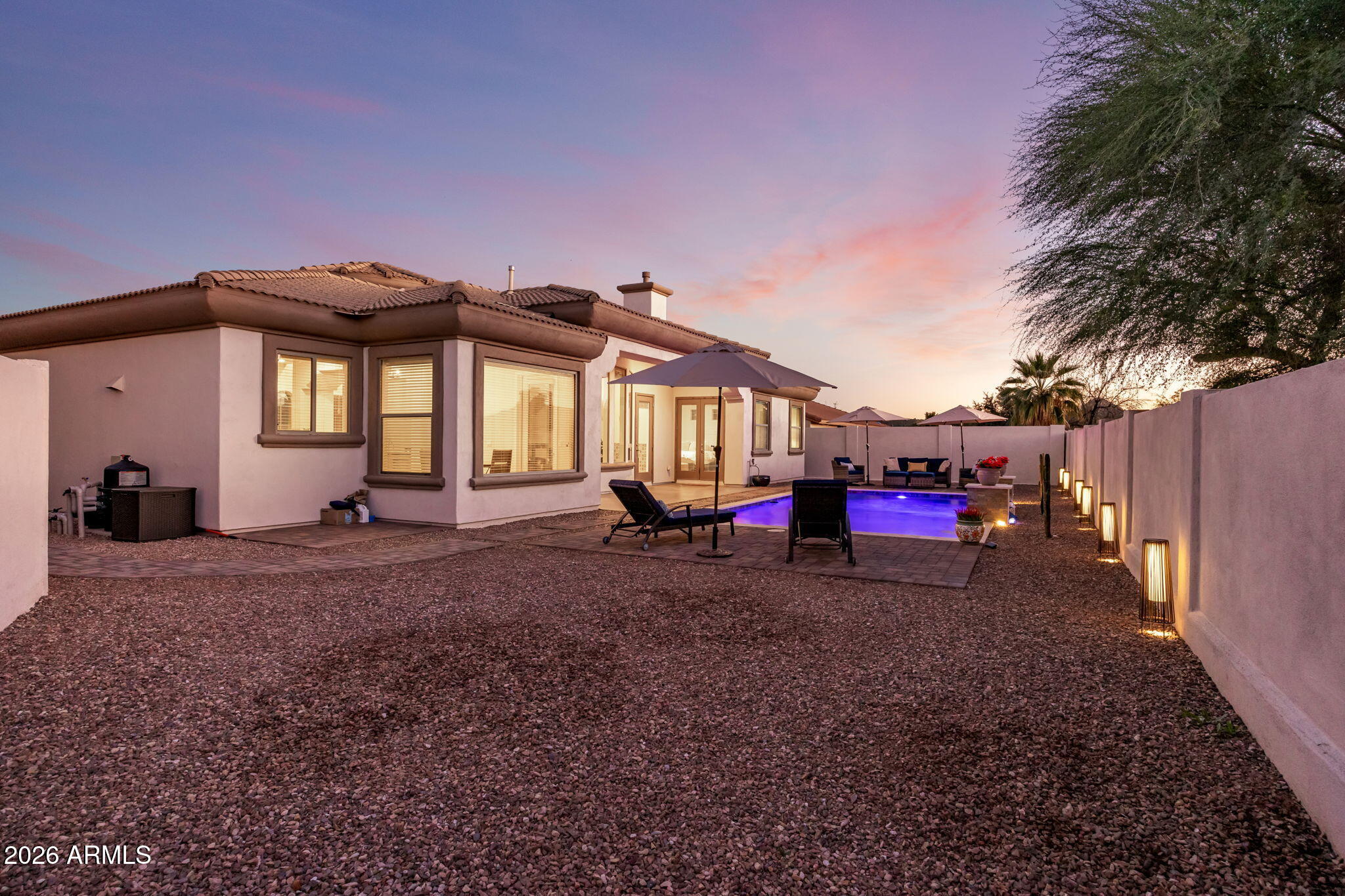 14112 North 12th Street Phoenix, AZ 85022 - Photo 38 of 46 a view of a house with a backyard and porch