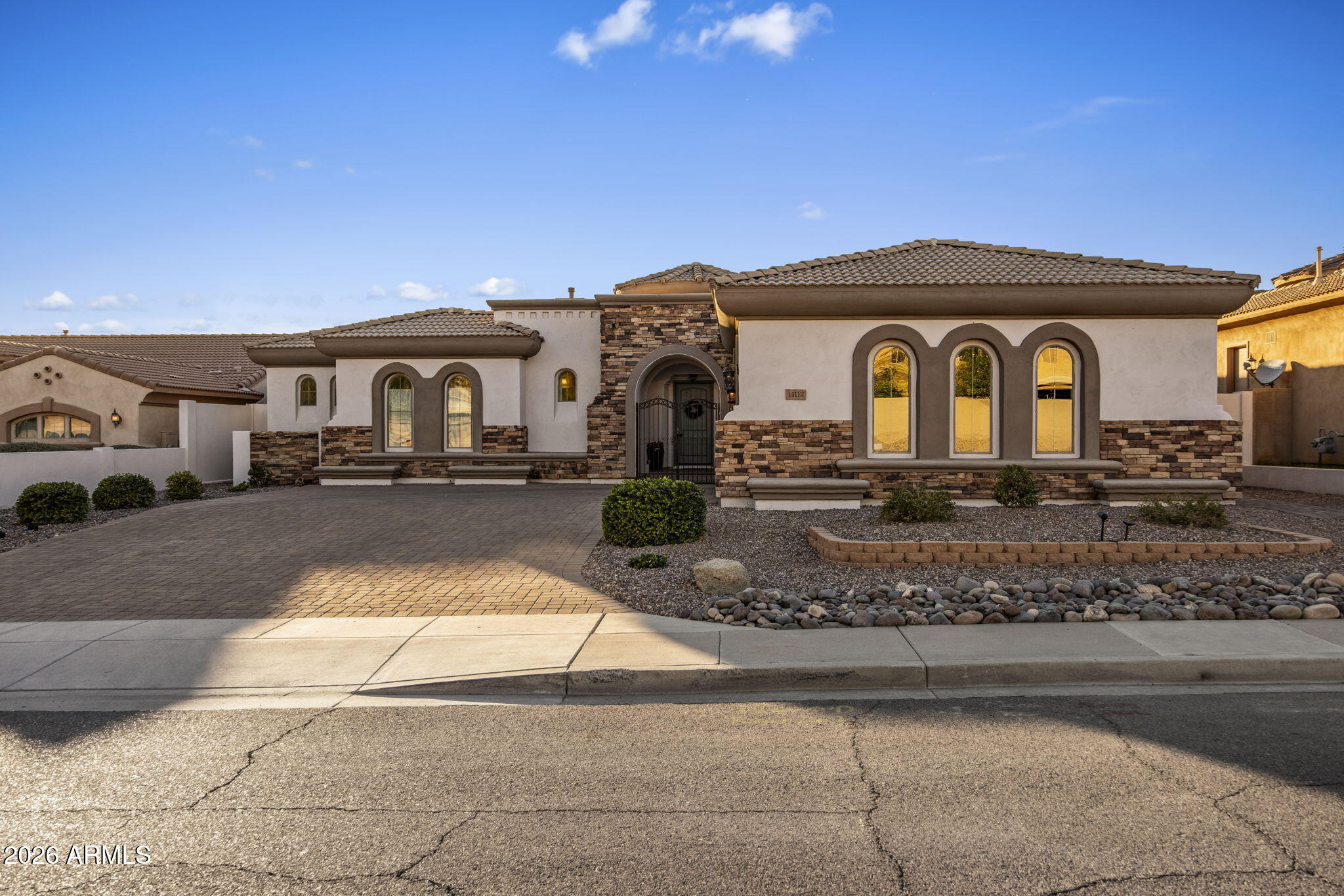 14112 North 12th Street Phoenix, AZ 85022 - Photo 45 of 46 a front view of a house with garden
