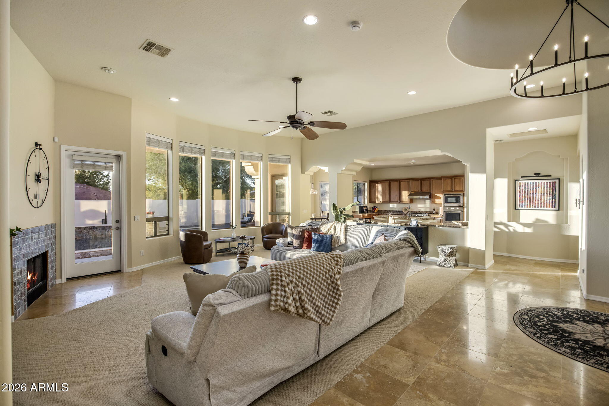 14112 North 12th Street Phoenix, AZ 85022 - Photo 5 of 46 a living room with furniture and a chandelier