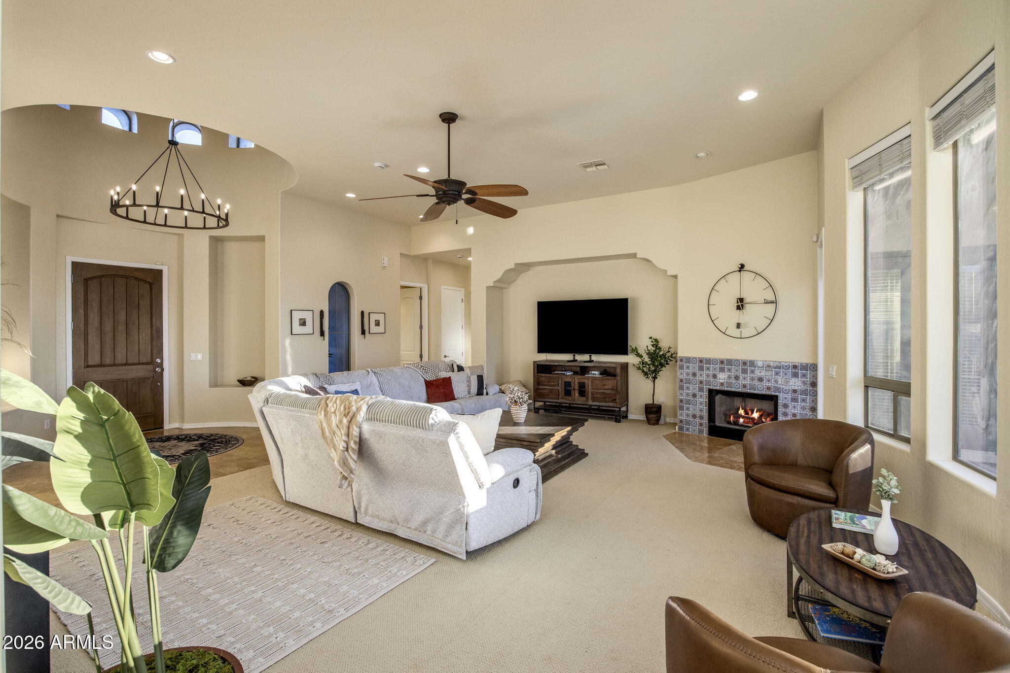 14112 North 12th Street Phoenix, AZ 85022 - Photo 7 of 46 a living room with furniture a large window and a flat screen tv