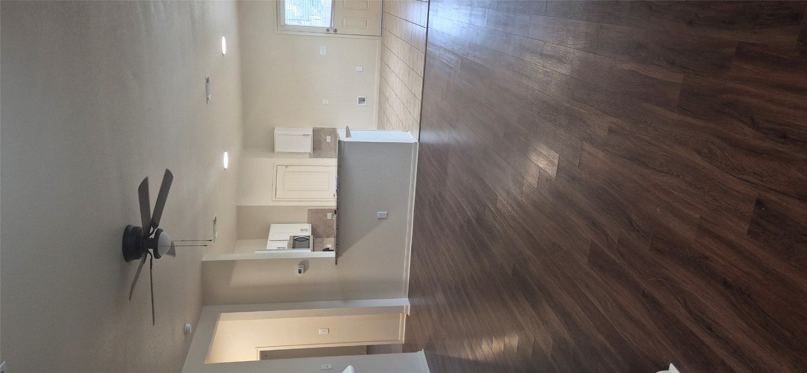 200 Moulins Lane Georgetown, TX 78626 - Photo 5 of 8 a view of a room with wooden floors