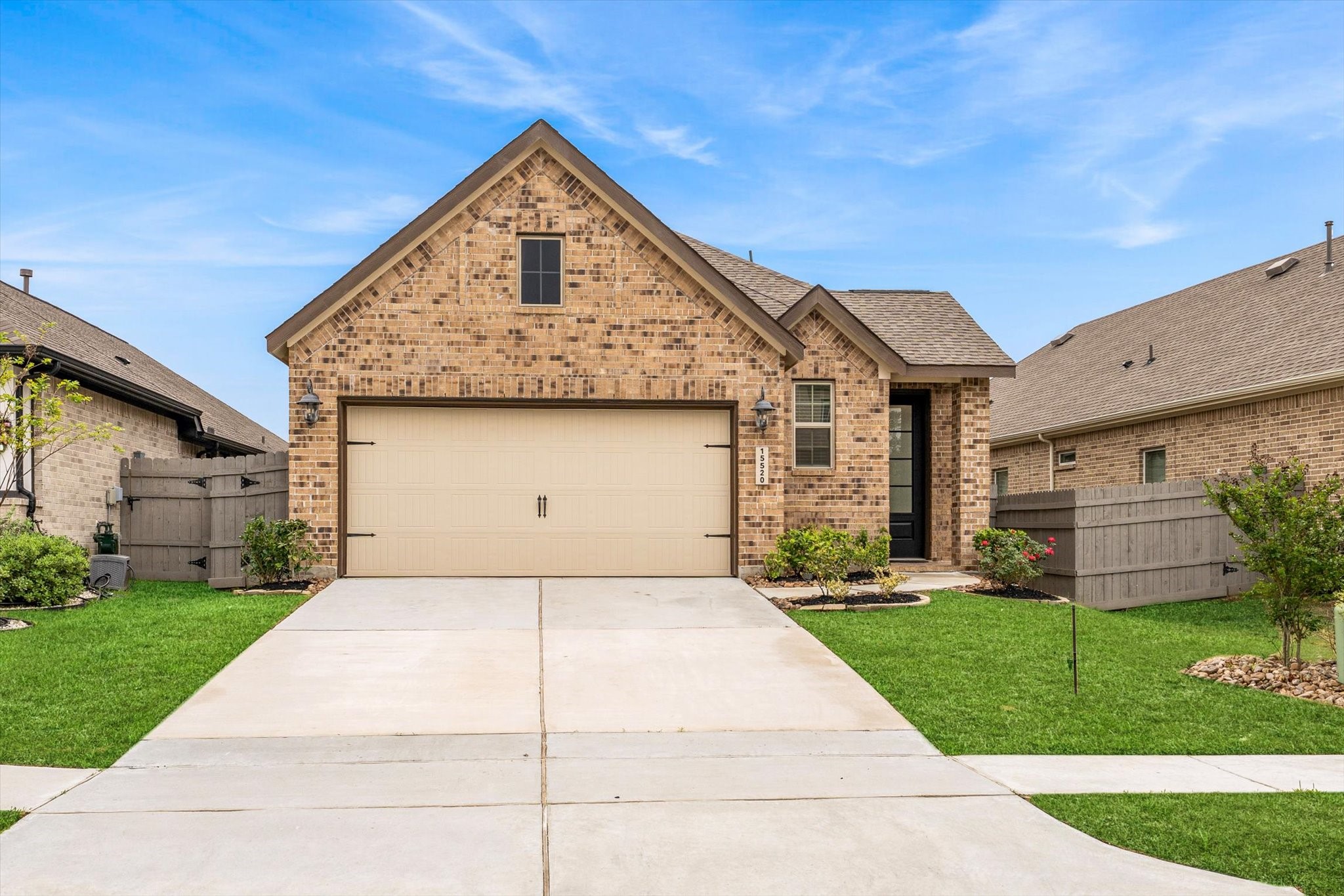 15520 Sunset Maple Court Conroe, TX 77302 - Photo 31 of 46 a front view of a house with a yard