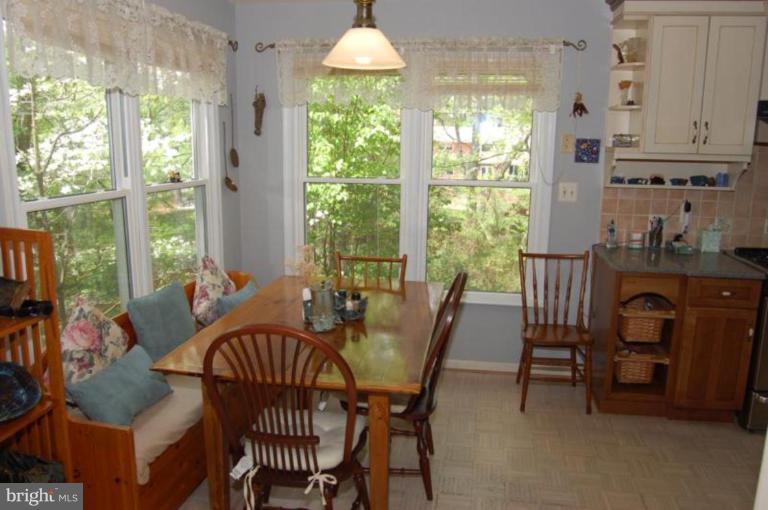 13114 Broadmore Road Silver Spring, MD 20904 - Photo 2 of 22 a view of a dining room with furniture window and outside view