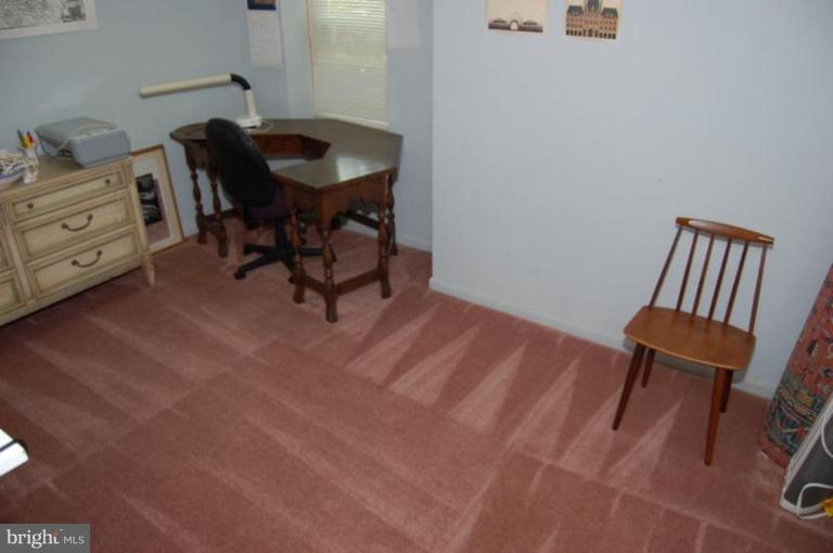 13114 Broadmore Road Silver Spring, MD 20904 - Photo 16 of 22 a workspace with furniture and a chair