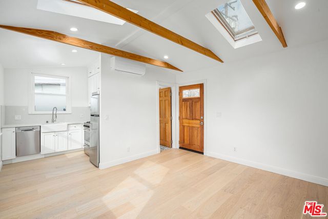 a view of a kitchen cabinets and a kitchen