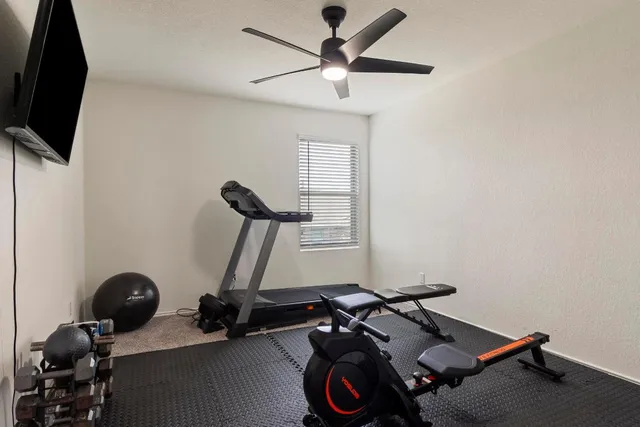 a view of a workspace with furniture