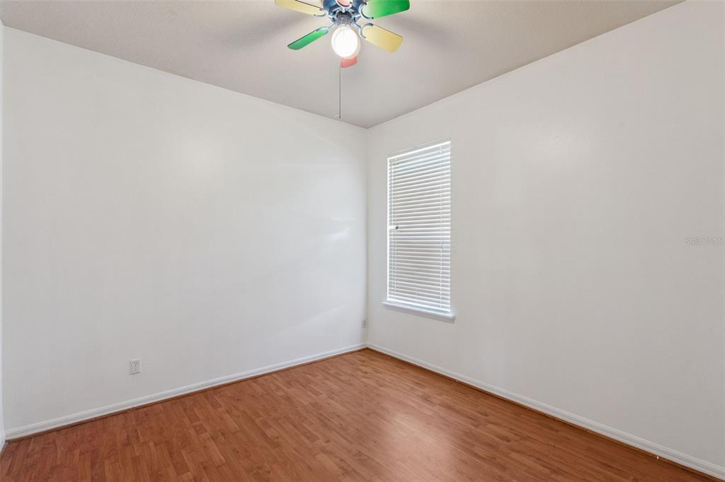 774 Lancer Circle Ocoee, FL 34761 - Photo 18 of 35 wooden floor in an empty room with a window