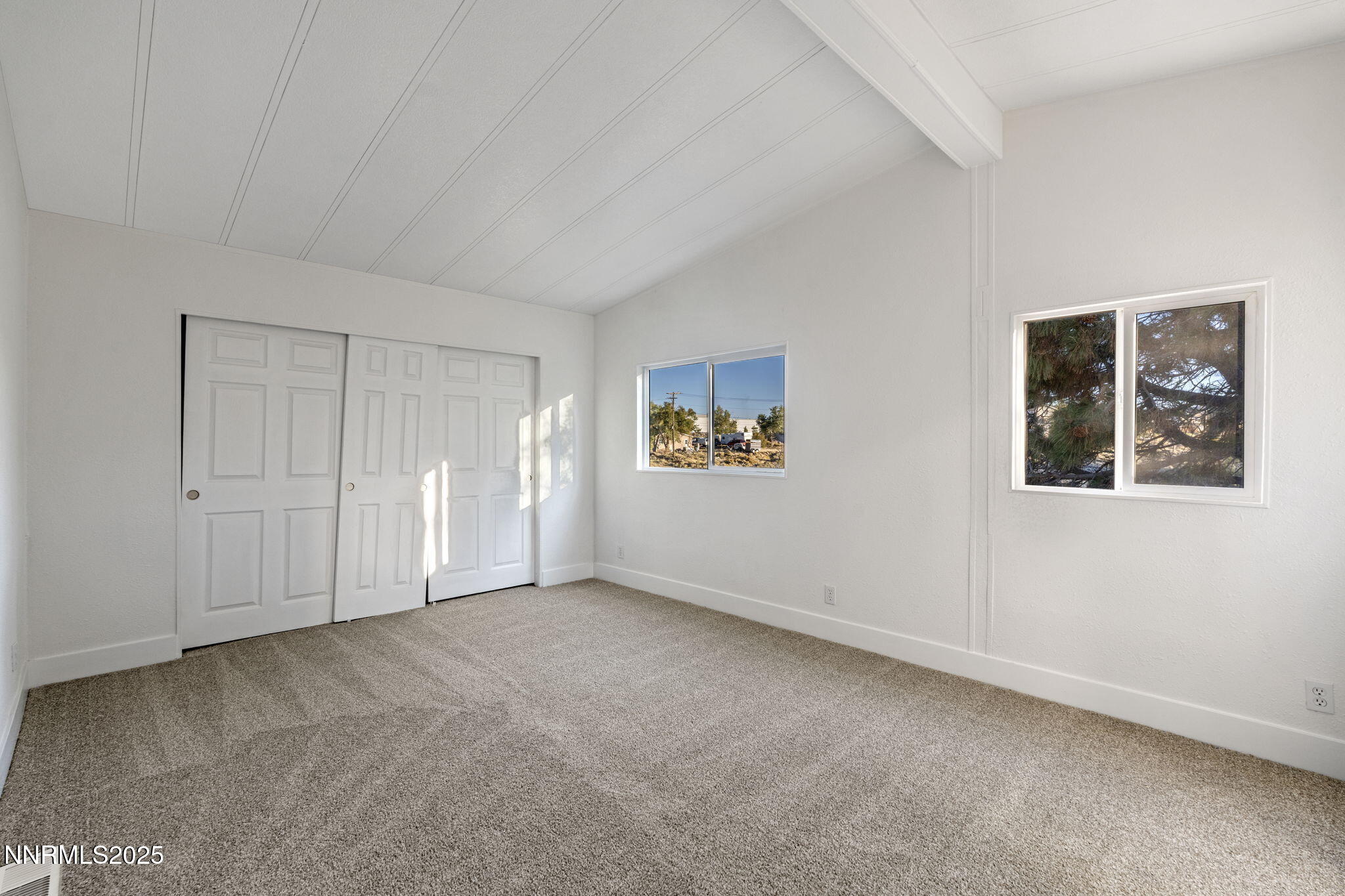 230 Medgar Avenue Reno, NV 89506 - Photo 19 of 43 a view of an empty room with a window