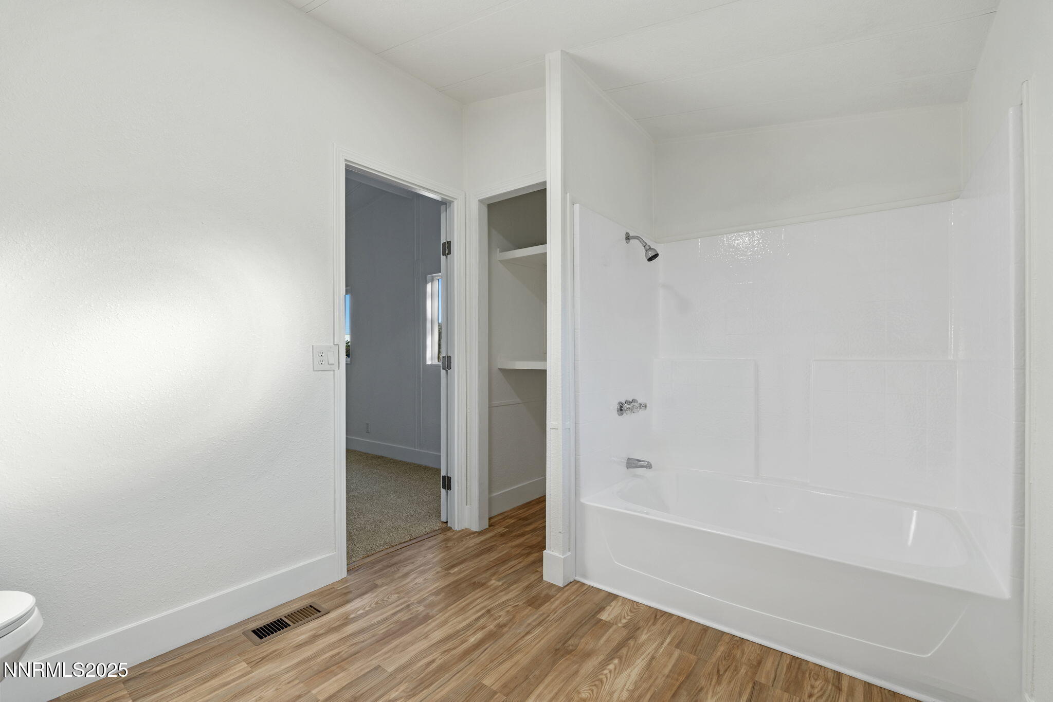 230 Medgar Avenue Reno, NV 89506 - Photo 21 of 43 a bathroom with a bathtub and a shower