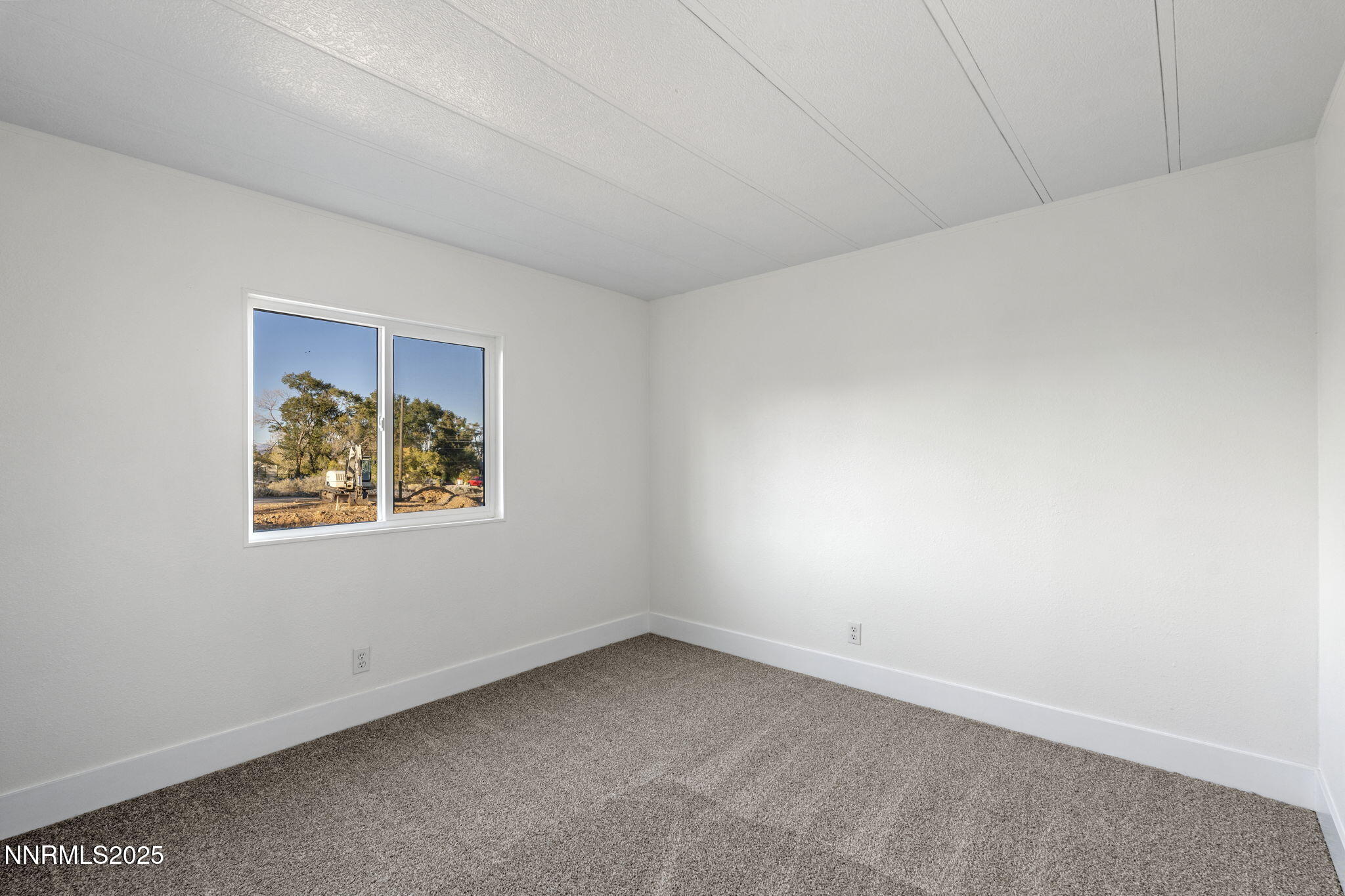 230 Medgar Avenue Reno, NV 89506 - Photo 23 of 43 an empty room with a window