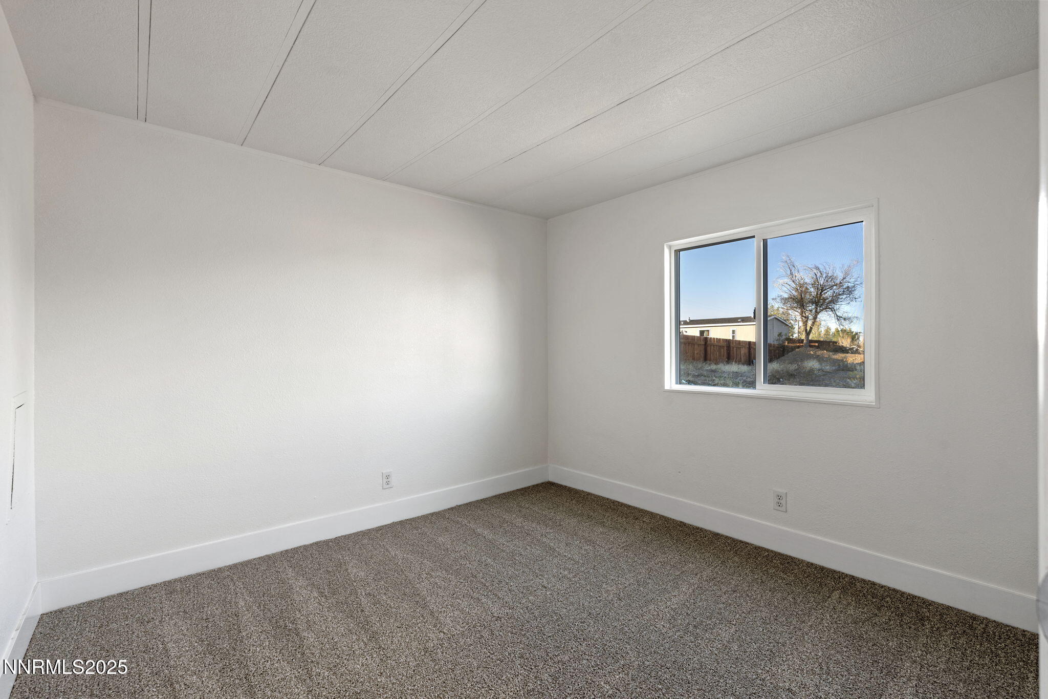 230 Medgar Avenue Reno, NV 89506 - Photo 24 of 43 an empty room with a window