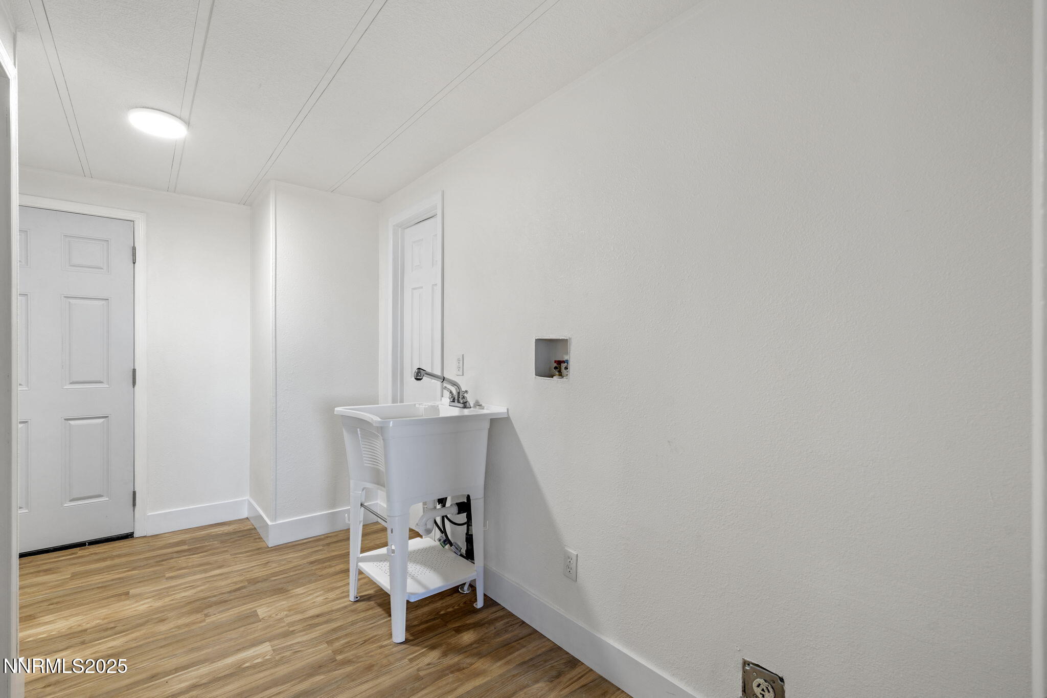 230 Medgar Avenue Reno, NV 89506 - Photo 25 of 43 a bathroom with a sink and a toilet