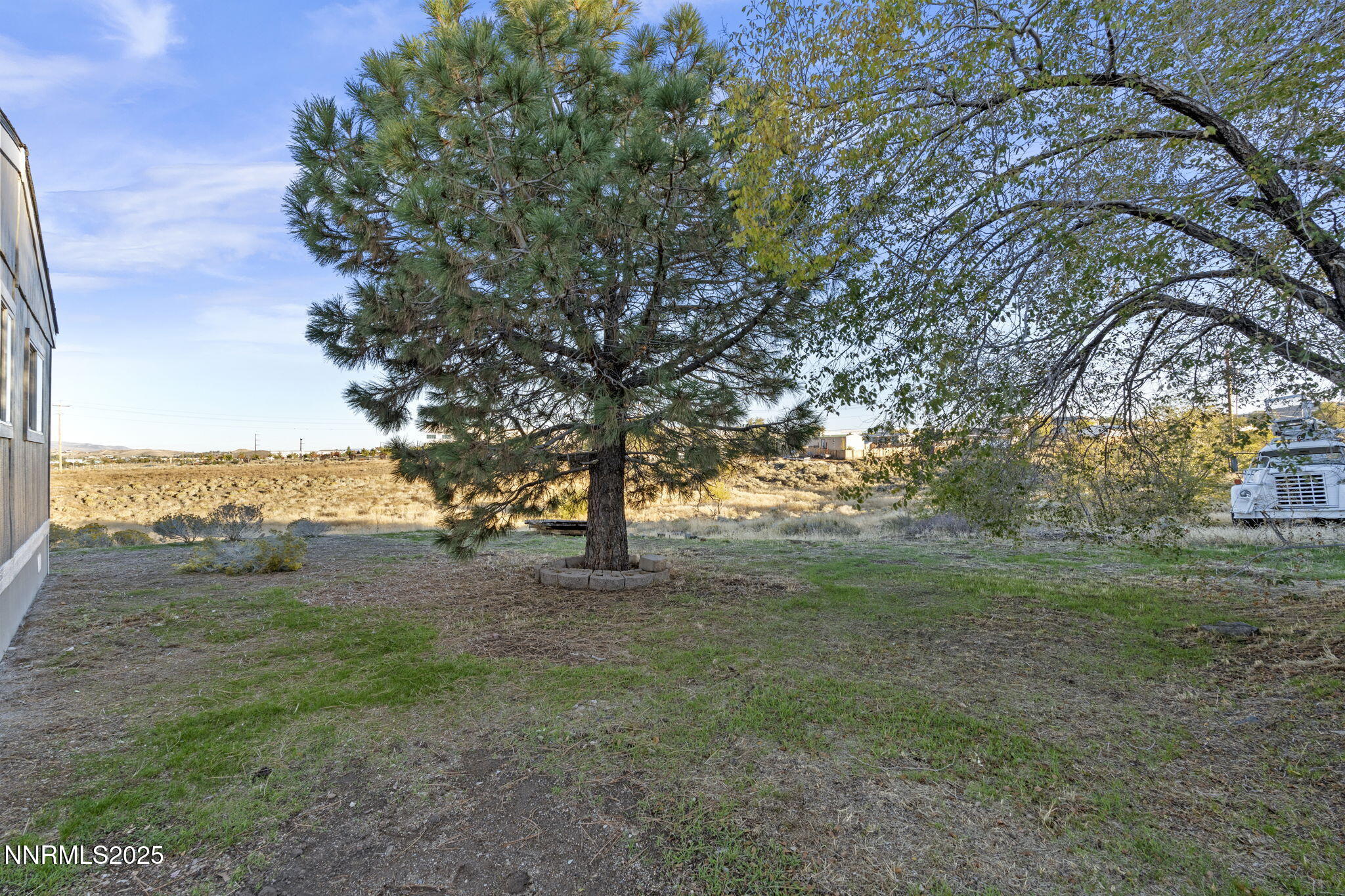 230 Medgar Avenue Reno, NV 89506 - Photo 26 of 43 a view of an ocean with a large tree