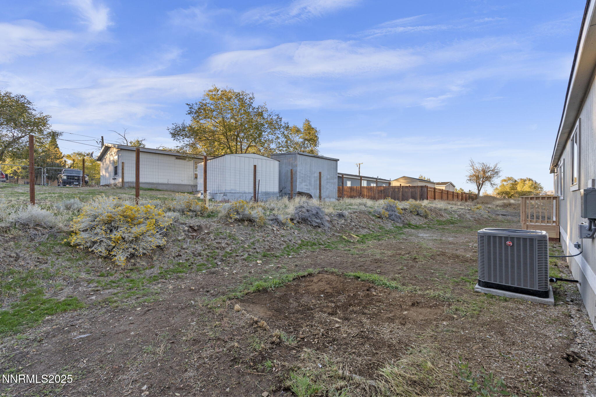 230 Medgar Avenue Reno, NV 89506 - Photo 39 of 43 a backyard of a house with lots of green space