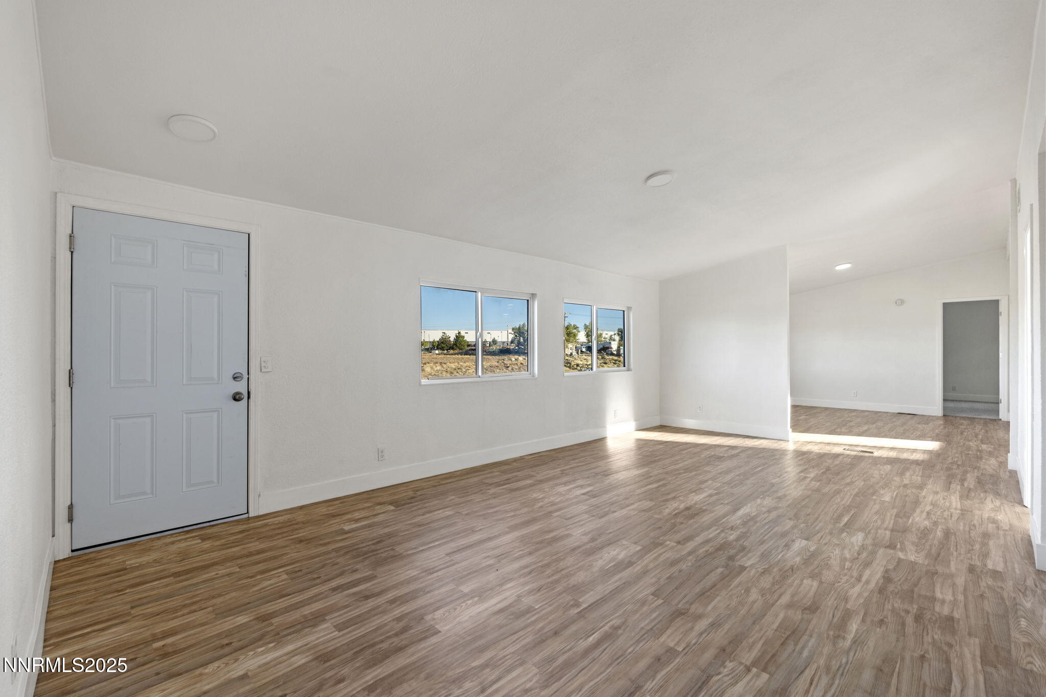 230 Medgar Avenue Reno, NV 89506 - Photo 4 of 43 a view of empty room with wooden floor