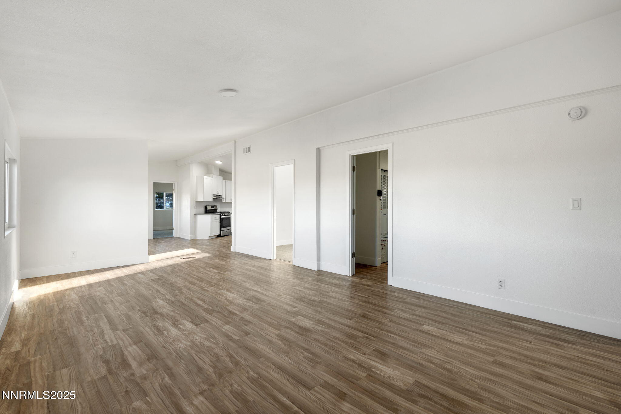 230 Medgar Avenue Reno, NV 89506 - Photo 5 of 43 a view of empty room with wooden floor