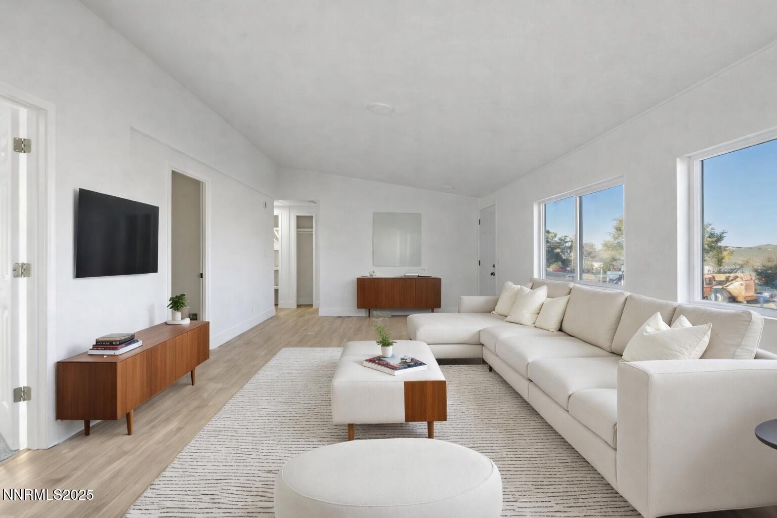 230 Medgar Avenue Reno, NV 89506 - Photo 8 of 43 a living room with furniture and a flat screen tv