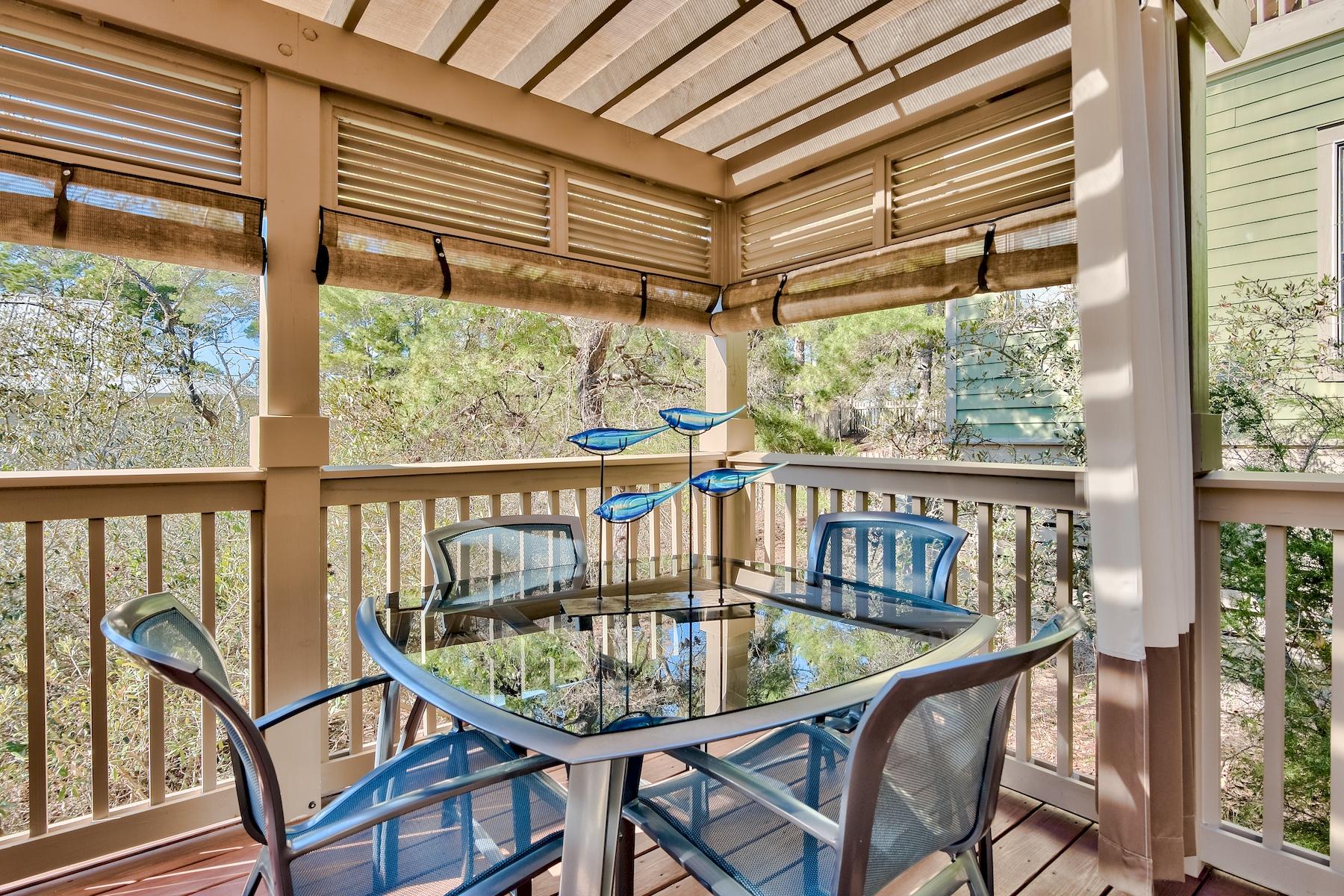 25 South Summit Drive Santa Rosa Beach, FL 32459 - Photo 20 of 46 a view of a balcony with furniture
