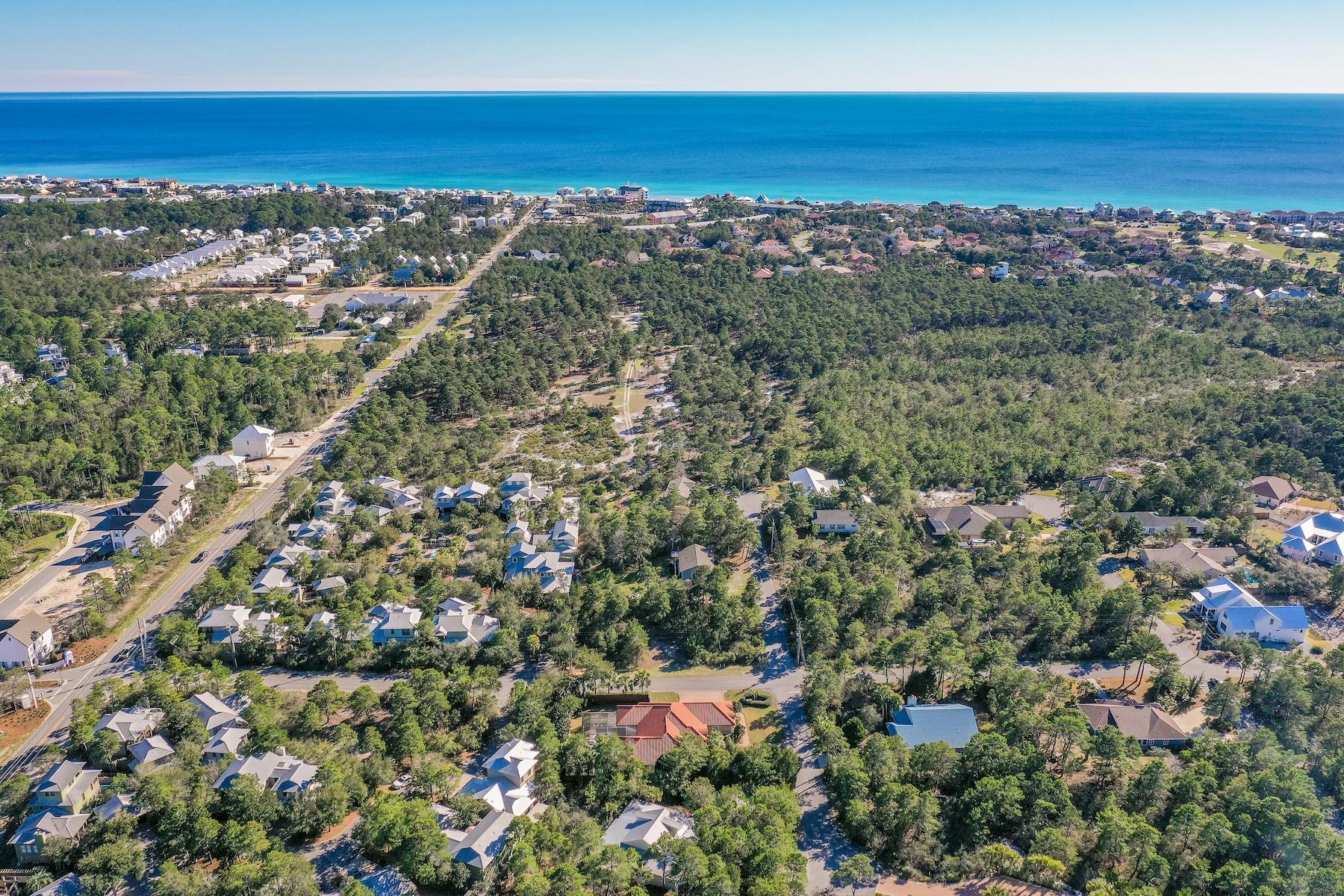 25 South Summit Drive Santa Rosa Beach, FL 32459 - Photo 43 of 46 an aerial view of residential houses with outdoor space and trees