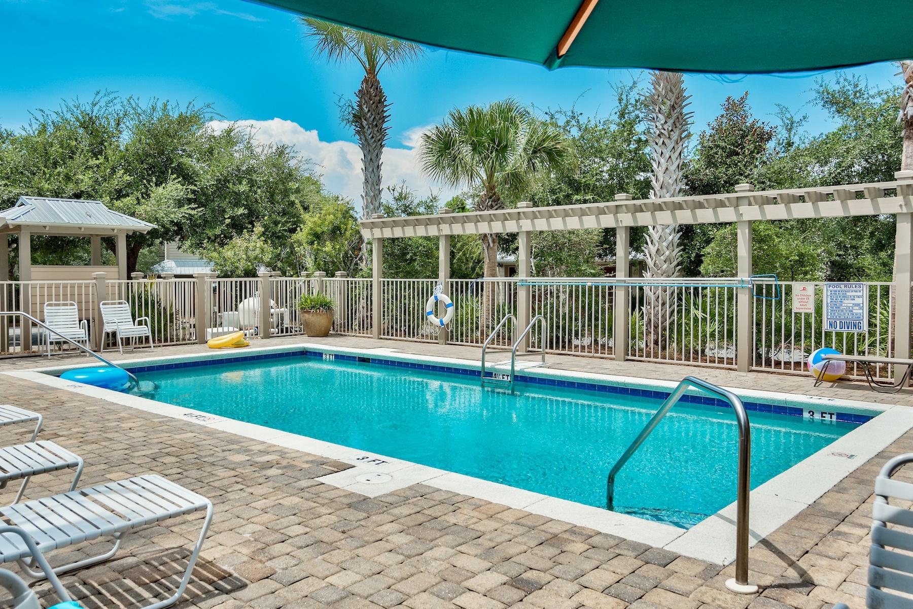 25 South Summit Drive Santa Rosa Beach, FL 32459 - Photo 46 of 46 a view of a swimming pool with a patio