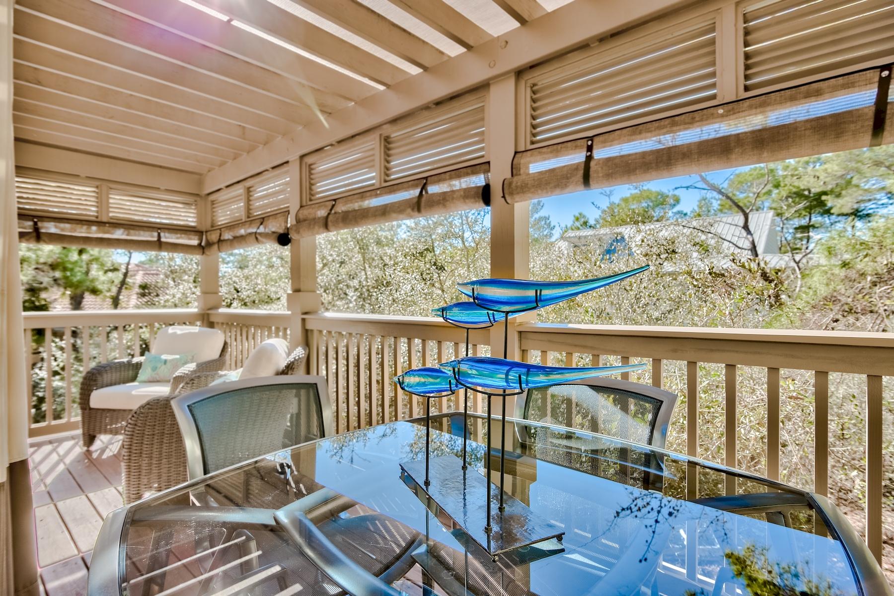 25 South Summit Drive Santa Rosa Beach, FL 32459 - Photo 5 of 46 a view of a balcony with furniture